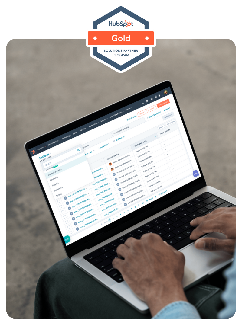 A laptop displaying the HubSpot user interface, with a prominent HubSpot Consultancy Partner badge overlayed, symbolising expert consultancy in HubSpot solutions.
